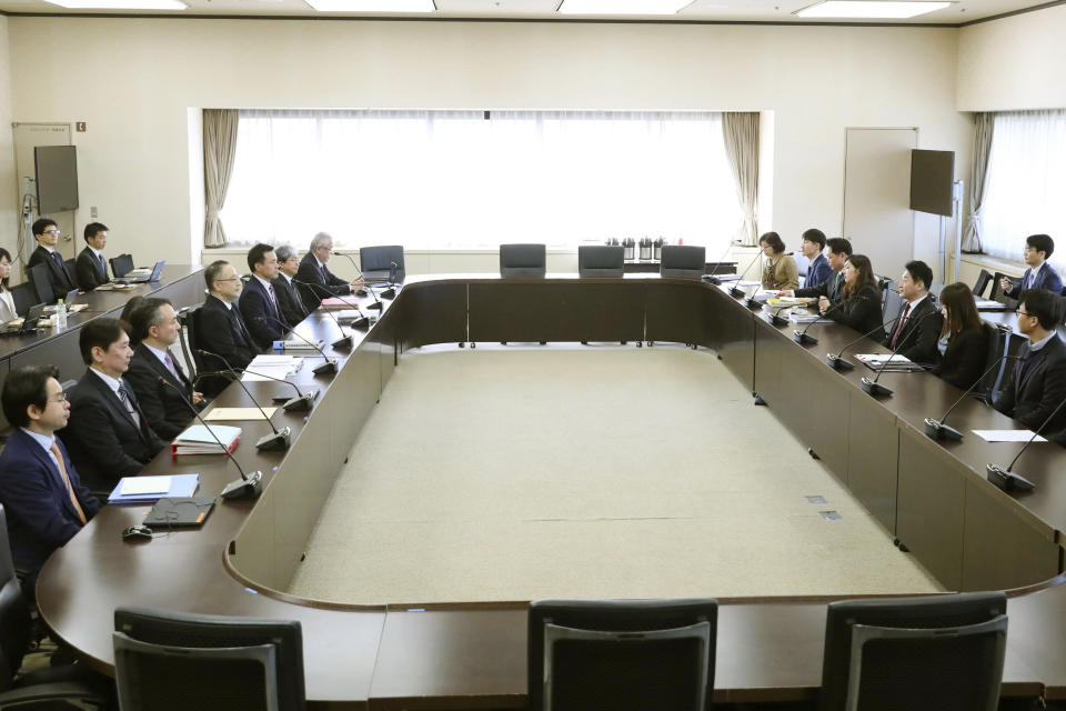 Lee Ho-hyeon, third from right, director-general for International Trade Policy at South Korea's Trade, Industry and Energy Ministry, and Yoichi Iida, fourth from left, director-general of Japan's Trade Control Department attend a director-general level meeting at the trade ministry in Tokyo Monday, Dec. 16, 2019. Senior officials from Japan and South Korea were holding talks Monday on high-tech exports for the first time since Tokyo tightened controls on South Korean semiconductor parts earlier this year. (Kyodo News via AP)