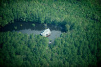 Flooding is seen in and around Wilmington, North Carolina, U.S., September 19, 2018 in this picture obtained from social media on September 21, 2018. ALAN CRADICK, CAPE FEAR RIVER WATCH/via REUTERS