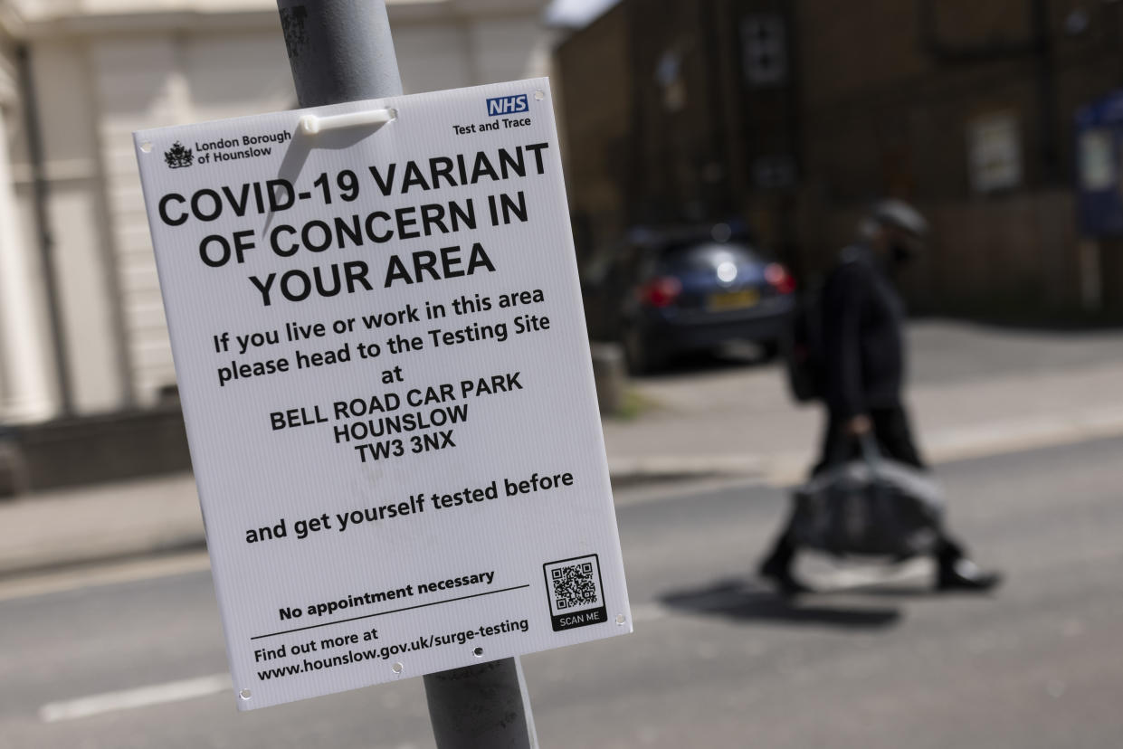 HOUNSLOW, ENGLAND - MAY 27: A sign directing people to a nearby vaccination centre is displayed on May 27, 2021 in Hounslow, England. The London borough of Hounslow is one of eight locations around England experiencing a rise in Covid-19 cases, driven largely by the virus variant first identified India. The variant, which is regarded as more transmissible than others that had predominated in England, has prompted concern about whether the UK can stick to its timeline for ending social restrictions. (Photo by Dan Kitwood/Getty Images)