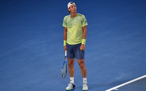 Czech Republic's Tomas Berdych reacts against Switzerland's Roger Federer during their men's singles quarter-finals match on day 10 of the Australian Open tennis tournament in Melbourne on January 24, 2018 - Credit: AFP