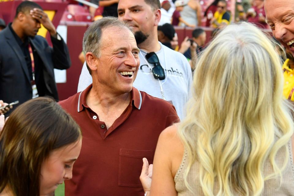 Washington Commanders owner Josh Harris on the field before the preseason game against the Baltimore Ravens at FedEx Field.