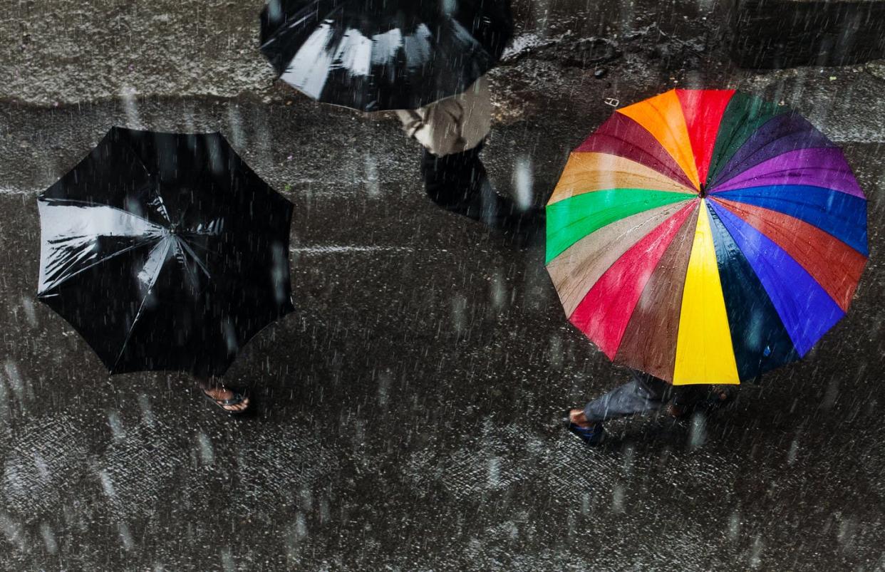 <span class="caption">A downpour or a drizzle: What causes the difference?</span> <span class="attribution"><a class="link " href="https://www.gettyimages.com/detail/photo/rainbow-in-rain-royalty-free-image/122286751?adppopup=true" rel="nofollow noopener" target="_blank" data-ylk="slk:David Pinzer Photography/Moment via Getty Images;elm:context_link;itc:0;sec:content-canvas"> David Pinzer Photography/Moment via Getty Images</a></span>