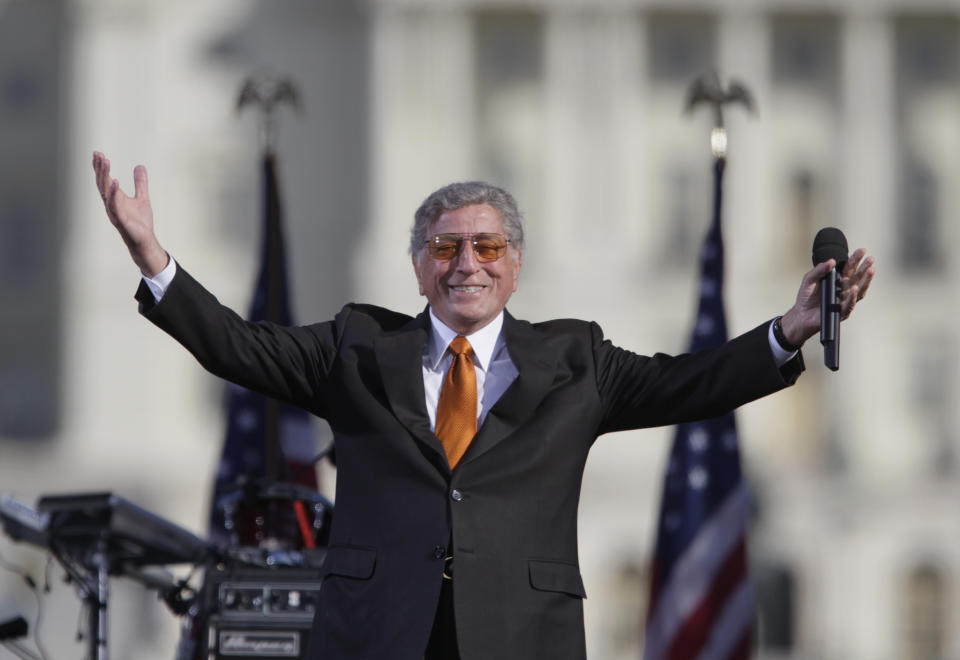 FILE - Singer Tony Bennett reacts to the crowd during his performance at comedians Jon Stewart's and Stephen Colbert's Rally to Restore Sanity and/or Fear on the National Mall in Washington, Saturday, Oct. 30, 2010. Bennett, the eminent and timeless stylist whose devotion to classic American songs and knack for creating new standards such as "I Left My Heart In San Francisco" graced a decadeslong career that brought him admirers from Frank Sinatra to Lady Gaga, died Friday, July 21, 2023. He was 96. (AP Photo/Carolyn Kaster, File)