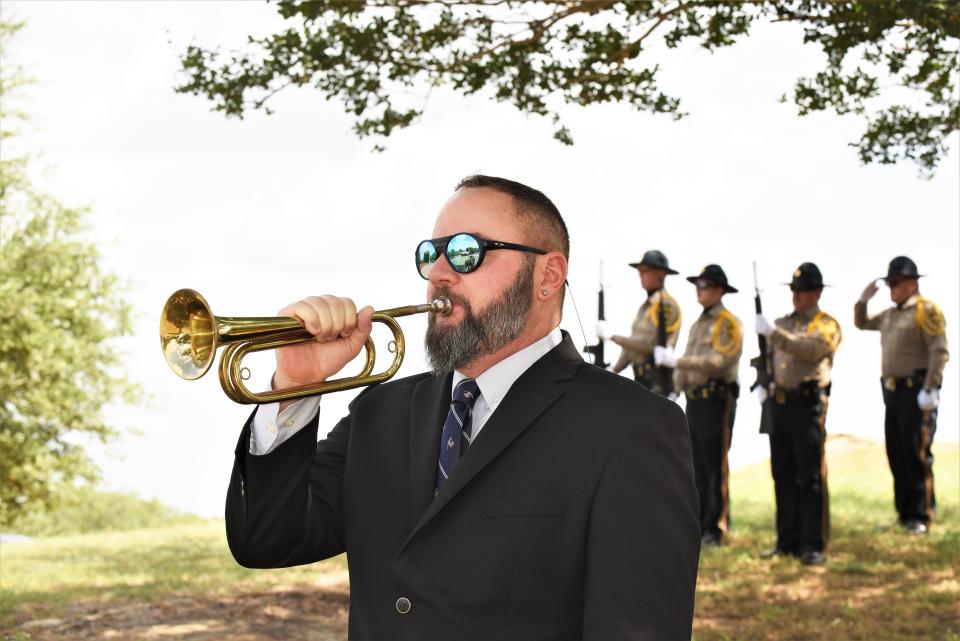 Retired Bastrop Police Department Detective Jason Pierson played a stirring “Taps” to conclude the Memorial Day ceremony.