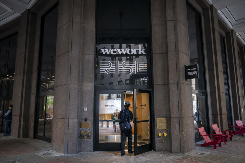 NEW YORK, NY - SEPTEMBER 13:  A man enters a WeWork office facility stands in the Financial District in New York City on September 13, 2019. WeWork has chosen to list their IPO on the Nasdaq with a September 23 trading debut. The company is now considering a valuation of potentially less than $20 billion after being previously valued on the private market for as much as $47 billion. The company has also reduced CEO Adam Neumann's voting power after receiving sharp criticism of their corporate governance. (Photo by Drew Angerer/Getty Images)