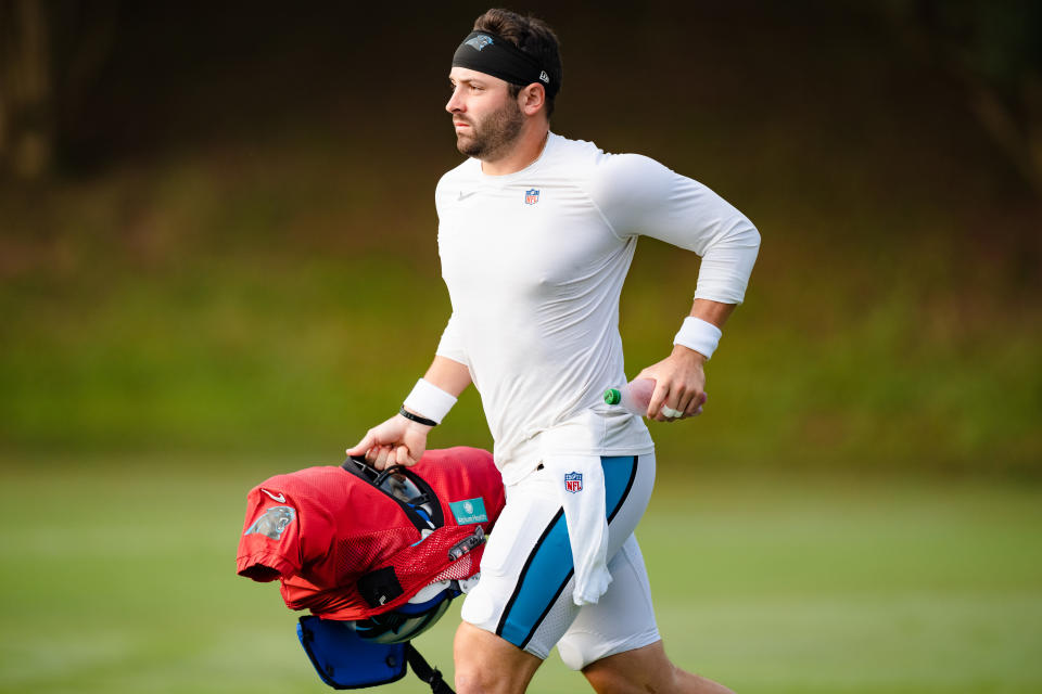 SPARTANBURG, SOUTH CAROLINA - AUGUST 06: Quarterback Baker Mayfield #6 of the Carolina Panthers runs onto the field at the start of training camp on August 06, 2022 in Spartanburg, South Carolina. (Photo by Jacob Kupferman/Getty Images)