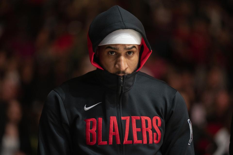 Portland Trail Blazers guard Gary Payton II stands for "Lift Every Voice and Sing" before an NBA basketball game against the Chicago Bulls Saturday, Feb. 4, 2023, in Chicago. (AP Photo/Erin Hooley)