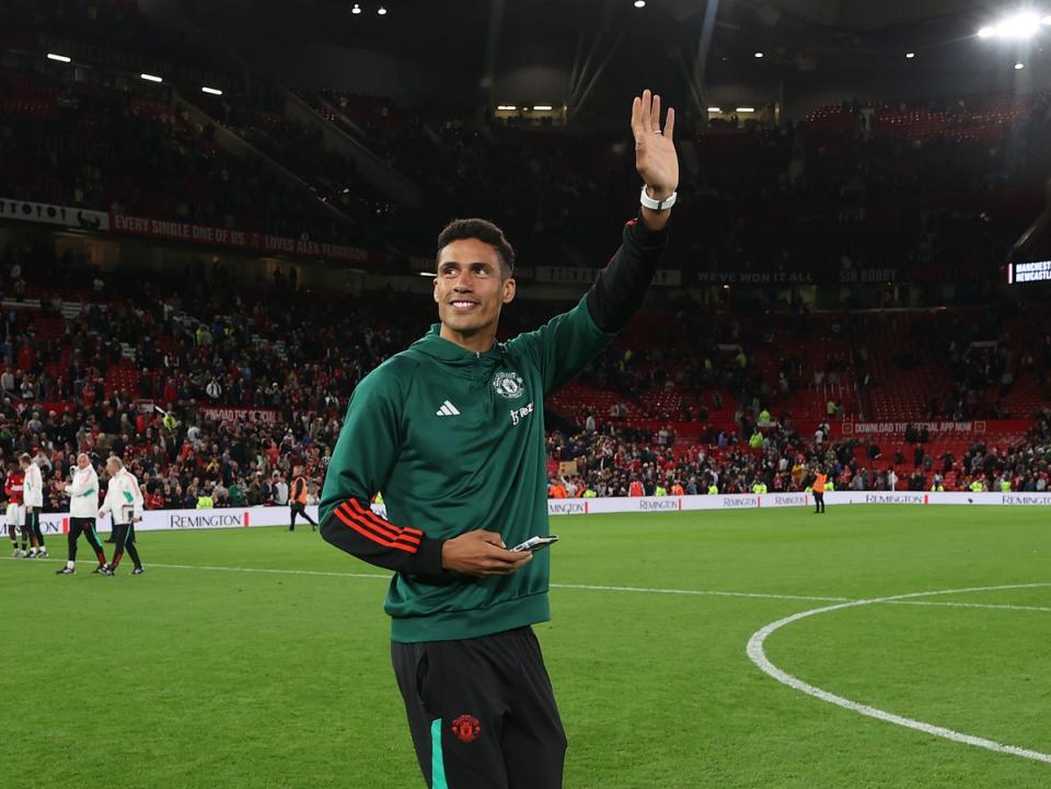 Raphael Varane of Manchester United says goodbye to the fans (Manchester United via Getty Imag)