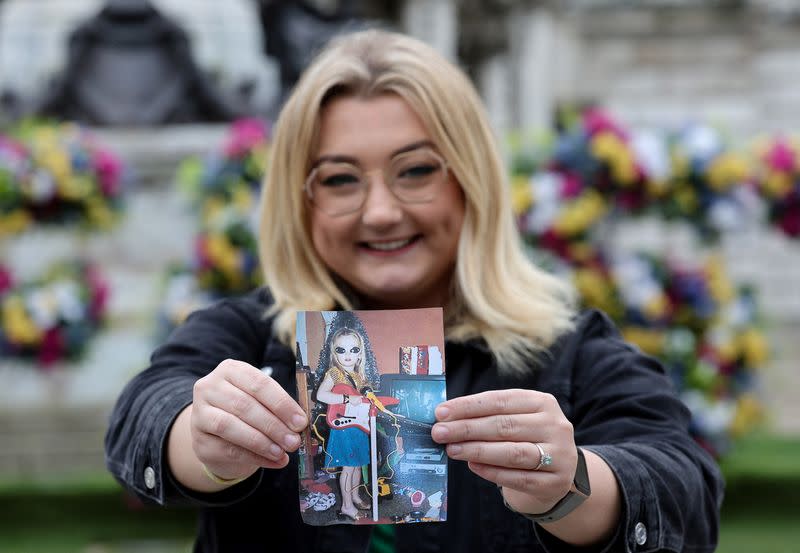 Courtney Wells poses for a picture outside Belfast City Hall