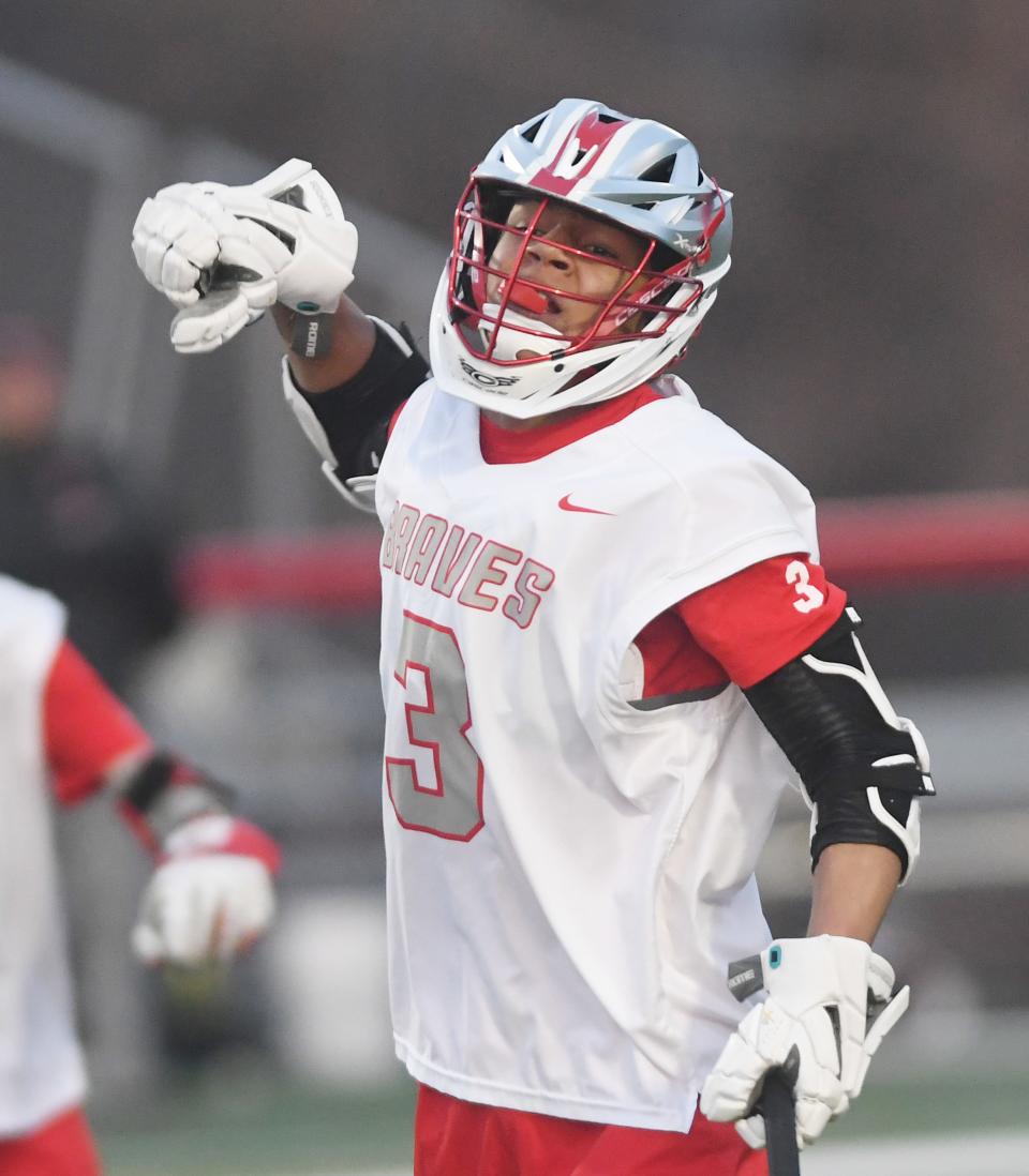 Jaxon Grant of Canandaigua celebrates his first half goal on Tuesday night during the Braves win over Webster Schroeder.