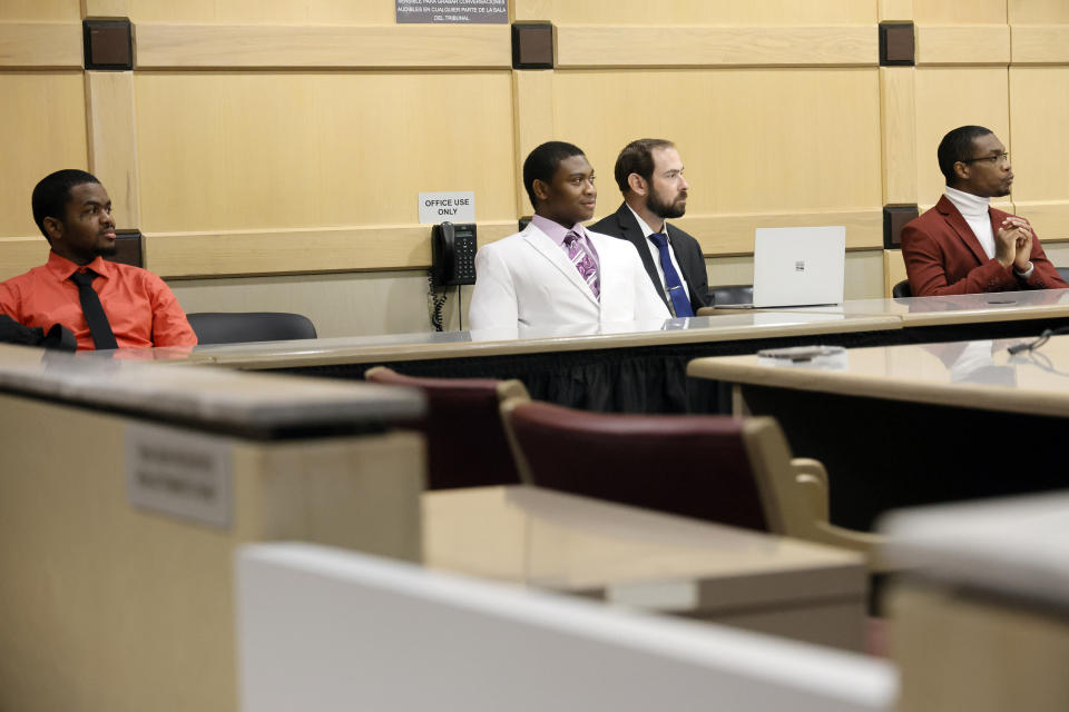 Suspected shooting accomplice Dedrick Williams, left, and Trayvon Newsome are shown seated at the defense table with shooting suspect Michael Boatwright, right, during the fourth day of jury deliberations in the XXXTentacion murder trial at the Broward County Courthouse in Fort Lauderdale, Fla., Monday, March 13, 2023. Emerging rapper XXXTentacion, born Jahseh Onfroy, 20, was killed during a robbery outside of Riva Motorsports in Pompano Beach in 2018, allegedly by defendants Boatwright, Newsome, and Williams. (Amy Beth Bennett/South Florida Sun-Sentinel via AP, Pool)