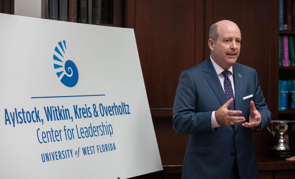 Director Tim Kinsella talks at a press conference Tuesday about the Aylstock, Witkin, Kreis & Overholtz Center for Leadership at the University of West Florida, which was recently named in recognition of a $2.5 million donation from the law firm.