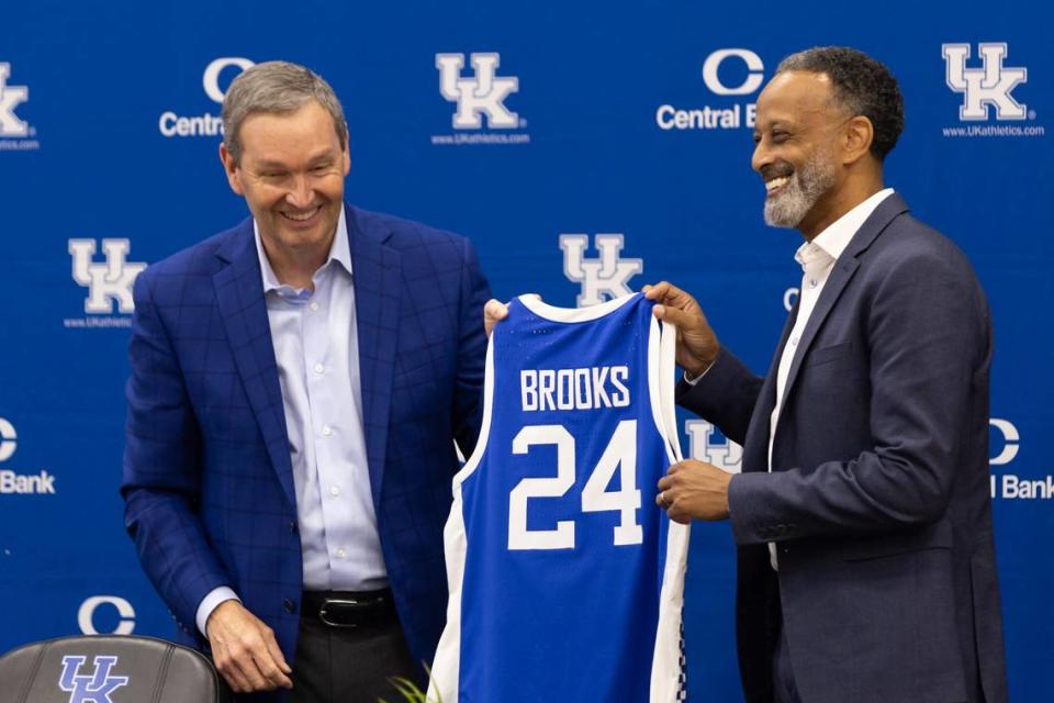 New head coach Kenny Brooks, right, and athletic director Mitch Barnhart, left, explained how they picture NIL collectives working on behalf of the women’s basketball program.