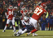 Kansas City Chiefs tight end Travis Kelce (87) makes a touchdown catch against New England Patriots defensive back J.C. Jackson (27) during the second half of the AFC Championship NFL football game, Sunday, Jan. 20, 2019, in Kansas City, Mo. (AP Photo/Charlie Riedel)