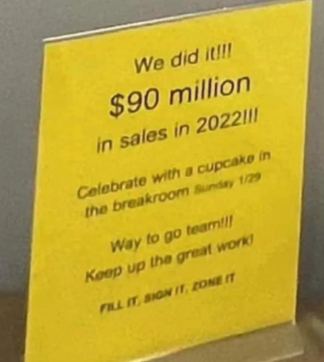 Sign celebrating $90 million in sales for 2022, invites to celebrate with a sundae in the breakroom on 1/29, and encourages team's good work