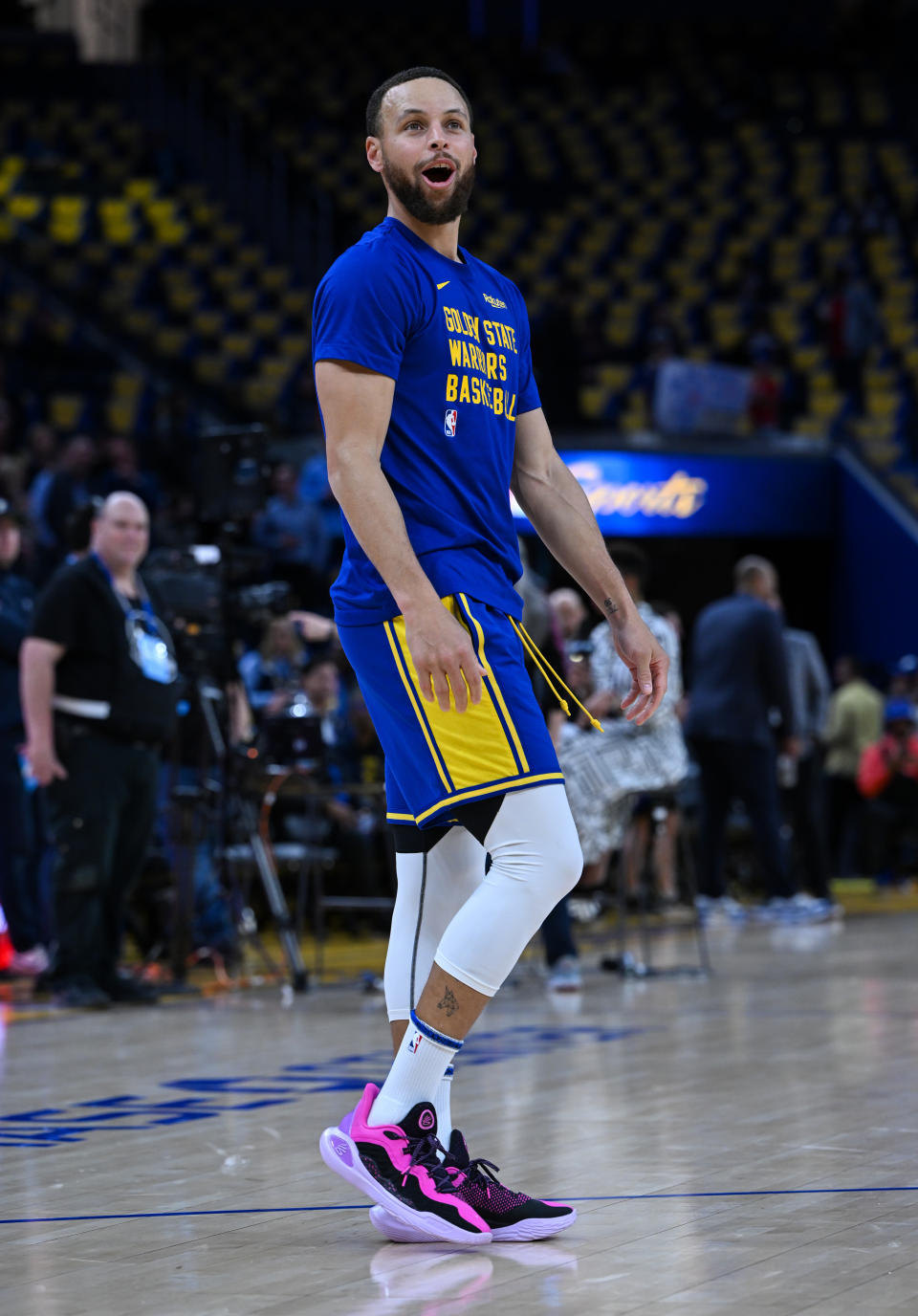 Stephen Curry wearing Under Armour Curry 11 GD sneakers on the court.