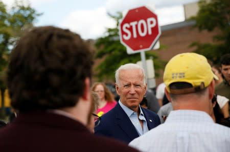 Democratic 2020 U.S. presidential candidate and former Vice President Joe Biden talks to reporters outside Lindy's Diner in Keene