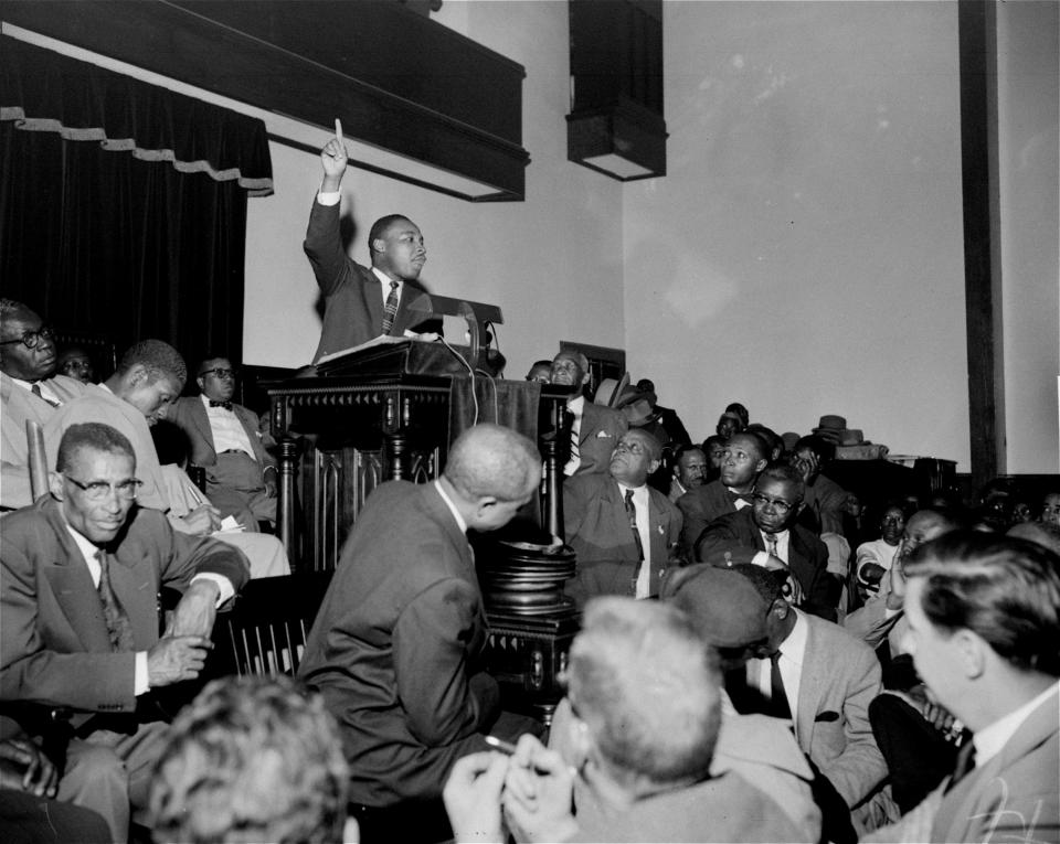 The Rev. Martin Luther King, Jr. is shown speaking to an overflow crowd at a mass meeting at the Holt Street Baptist Church.  King, leader of the mass bus boycott, was found guilty March 22, 1956 of conspiracy in the Montgomery bus boycott. He was fined $500.  King said the boycott of city buses will continue "no matter how many times they convict me."