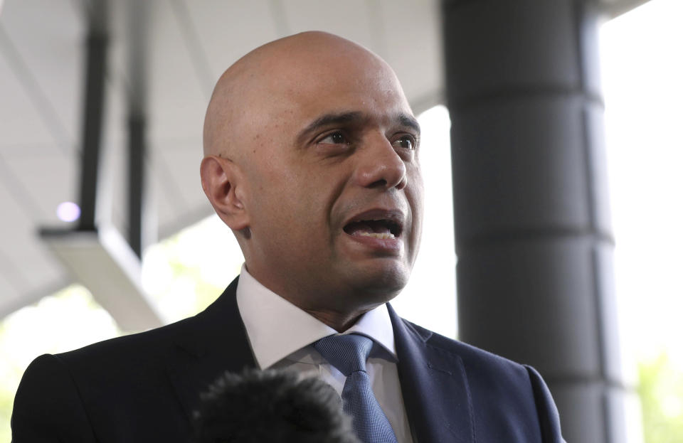 Conservative Party leadership contender Sajid Javid arrives for the Conservative National Convention meeting in central London, Saturday June 15, 2019. Britain's Conservative Party is holding a contest to replace Prime Minister Theresa May, and party legislators will continue to hold elimination votes until the final two contenders will be put to a vote of 160,000 Conservative Party members nationwide, with the winner due to become Conservative Party leader and prime minister late July. (Yui Mok/PA via AP)