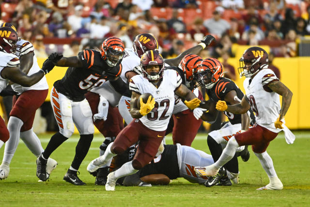 Aug 26, 2023; Landover, Maryland, USA; Washington Commanders running back Jaret Patterson (32) carries the ball against the Cincinnati Bengals during the second half at FedExField. Mandatory Credit: Brad Mills-USA TODAY Sports (Los Angeles Chargers)