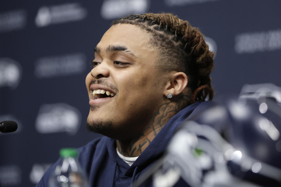 Seattle Seahawks 2024 first-round NFL football draft pick, Byron Murphy II smiles during a news conference at the team's headquarters Thursday, May 2, 2024, in Renton, Wash. (AP Photo/John Froschauer)