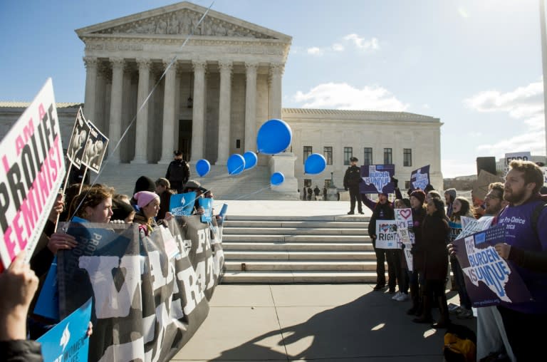 Supporters of legal access to abortion, as well as anti-abortion activists, rally outside the Supreme Court in Washington, DC, on March 2, 2016