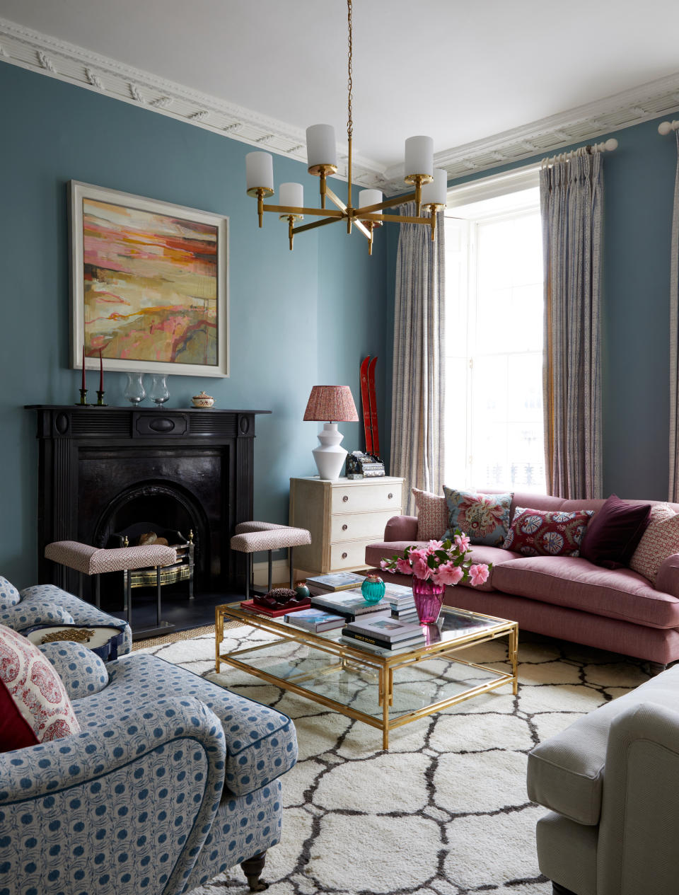<p> &apos;Interior designer Jessica Buckley is known for her punchy use of color and pattern and this scheme is one of my favorites for its use of bold color and mix of patterns in this sitting room,&apos; says Vivienne Ayers, Houses Editor of <em>Homes &amp; Gardens</em>. </p> <p> &#x2018;It&#x2019;s used mostly after dark so I opted for a deeper more dramatic saturated color that would be cozier in the evening,&#x2019; says Jessica. &apos;The cabinetry was painted in the same color as the walls.&apos; </p>