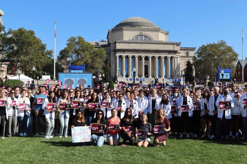 Medical students and victim advocates at Columbia University protested the institution's response to alleged sexual abuse by Robert Hadden during a ceremony honoring the school's new president on Oct. 4.