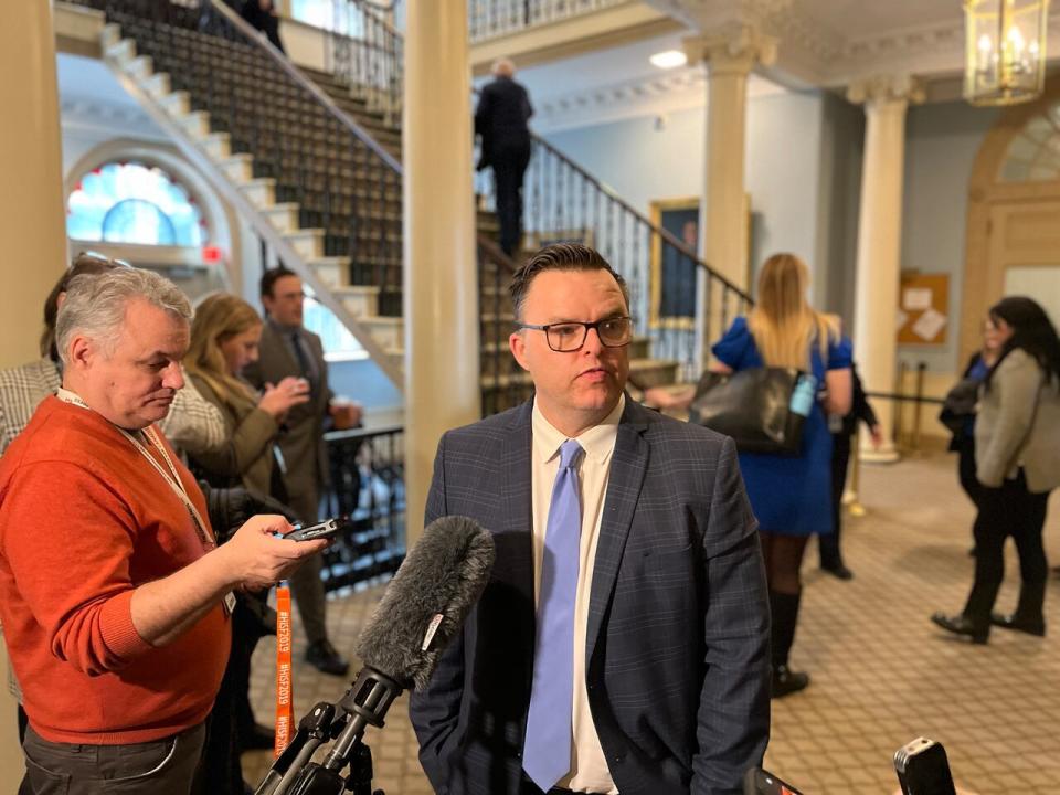 Community Services Minister Brendan Maguire speaks to reporters on Wednesday at Province House.