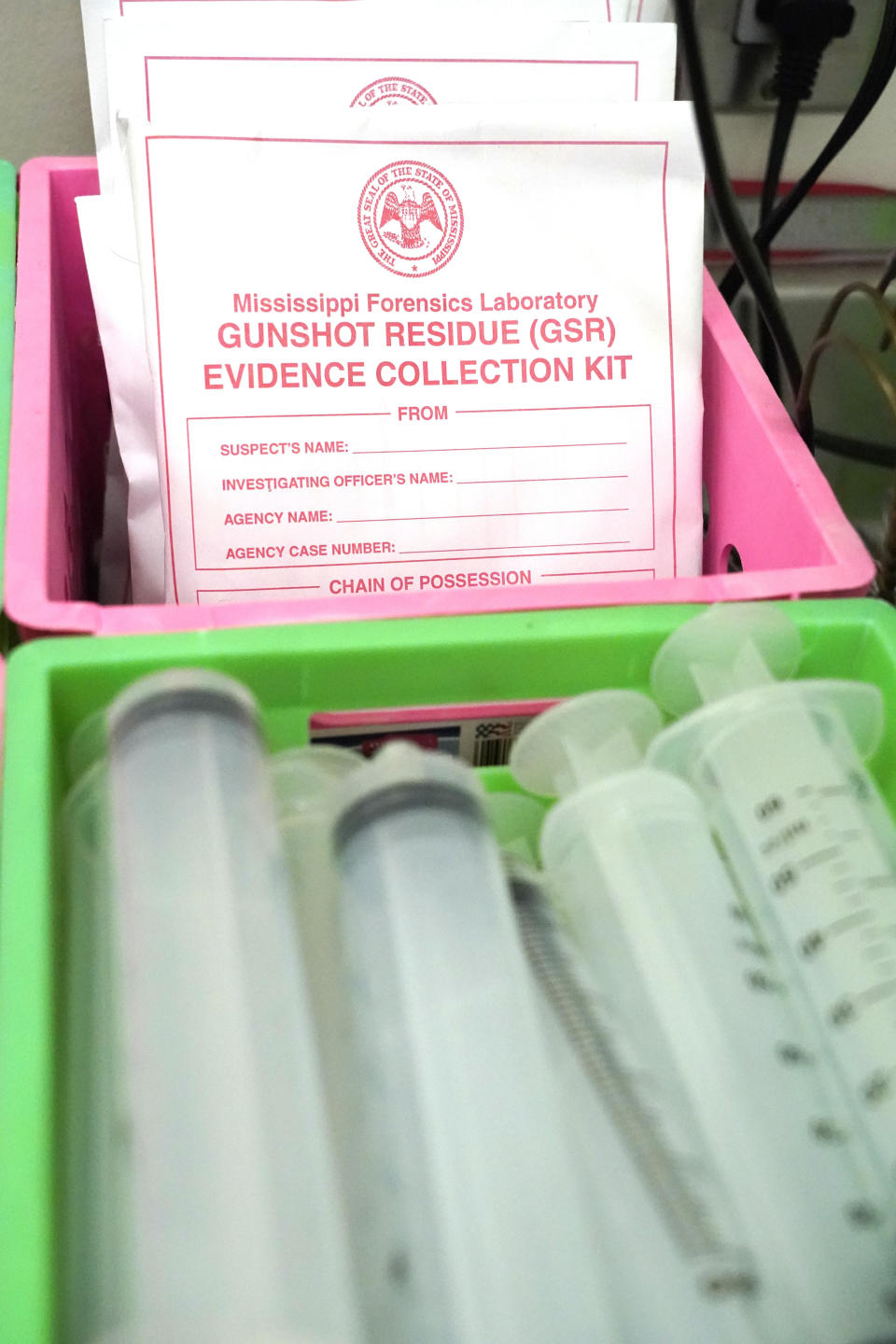 A gunshot residue collection kit is pictured in the autopsy room at the Mississippi Crime Laboratory in Pearl, Miss., Aug. 26, 2021. (AP Photo/Rogelio V. Solis)