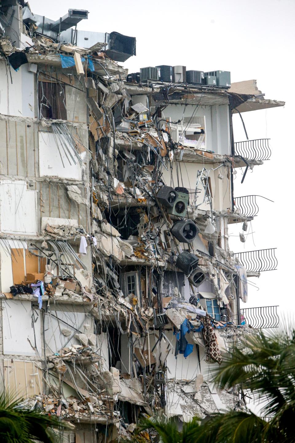 The 12-story condominium that partially collapsed early June 24 in Surfside, Fla.