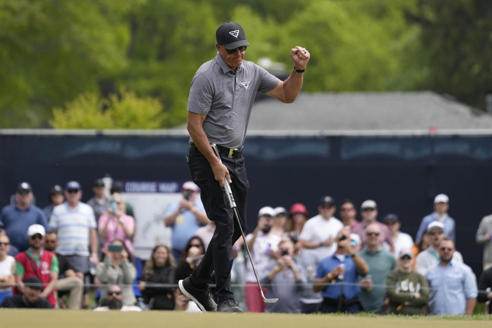 Phil Mickelson celebrates after a birdie on the fifth hole during the second round of the PGA Championship golf tournament at Oak Hill Country Club on Friday, May 19, 2023, in Pittsford, N.Y. (AP Photo/Seth Wenig)