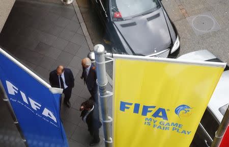 FIFA flags are pictured outside the Marritot hotel, where a meeting of the Confederation of African Football (CAF) is taking place, in Zurich, Switzerland, May 27, 2015. REUTERS/Arnd Wiegmann