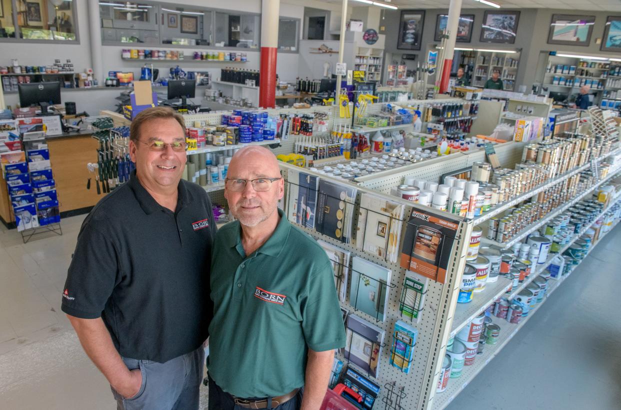 Brothers Pat, left, and Paul Berres continue to run the company their grandfather Herb purchased in 1950, Born Paint Co. at 317 Walnut St. in Peoria.