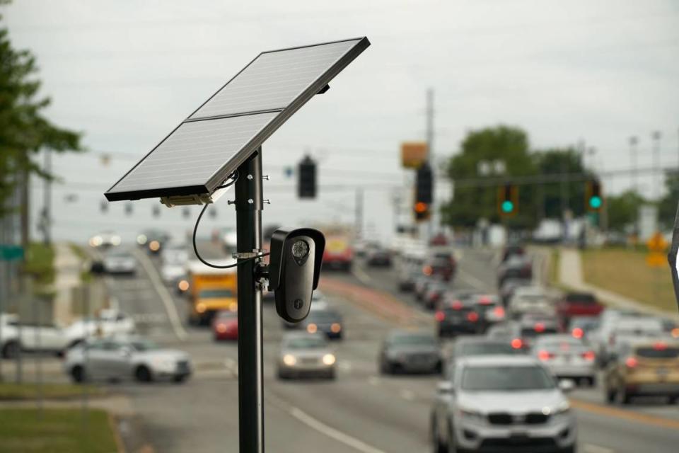 A Flock Safety license plate reader, mounted on a pole under a solar panel. Raleigh police are using 25 of the company’s cameras around the city, and Garner has 15.