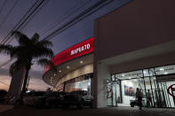 This Feb. 11, 2020 photo shows the Toyota dealership in Irapuato, Guanajuato state, Mexico. Gang killings have moved to the conservative industrial heartland state, creating a strange duality: shiny new auto plants and booming foreign investment even as the state becomes Mexico’s most violent. (AP Photo/Rebecca Blackwell)