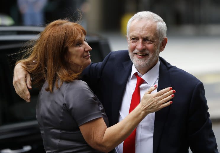 Labour leader greeted by a well-wisher (Rex)