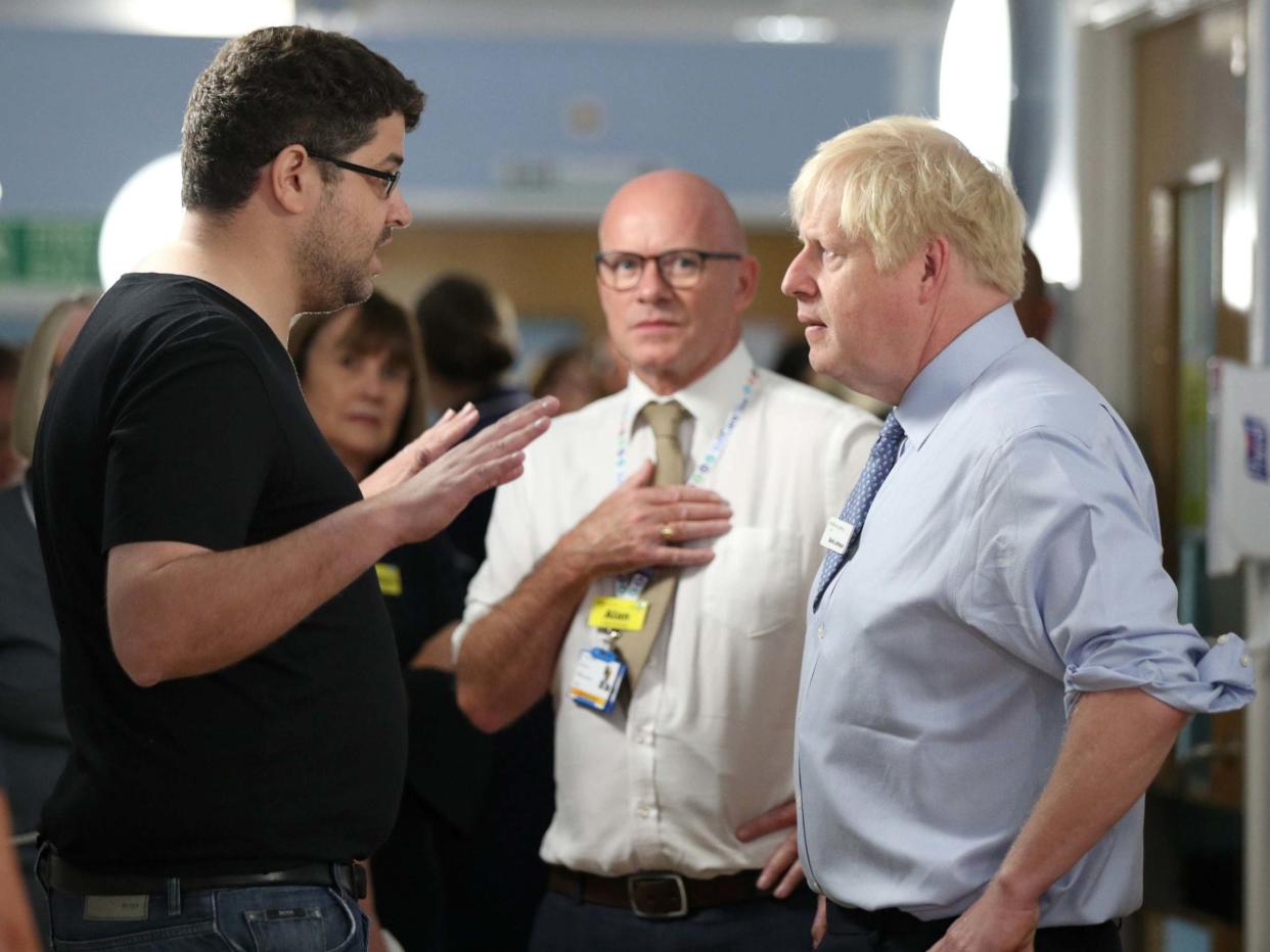 Perhaps the answer is to have more people like Omar Salem, left, who took it upon himself to berate the prime minister for using the NHS for press opportunities: PA