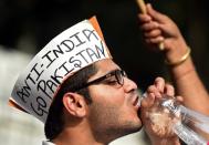 <p>Activists from the right-wing student organisation Akhil Bharatiya Vidyarthi Parishad (ABVP) drinks water during a protest against students from Jawaharlal Nehru University (JNU), following arrests of student leaders over alleged seditious activity, in New Delhi on February 24, 2016. Indian police said February 24 they had arrested two students wanted in a sedition case that has sparked major protests after the pair gave themselves up following nearly two weeks on the run. AFP PHOTO / Prakash SINGH / AFP PHOTO / PRAKASH SINGH </p>