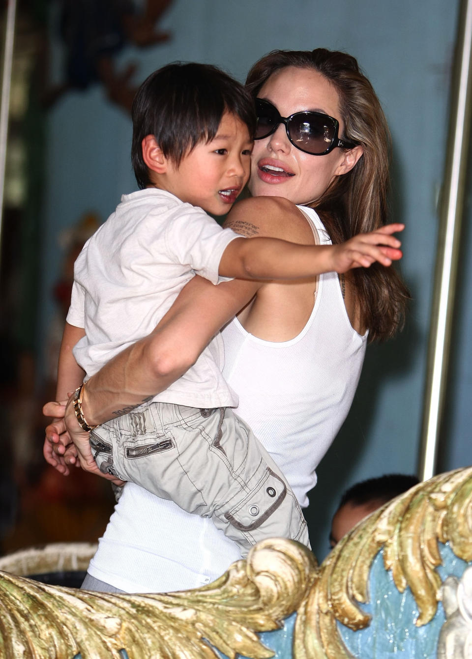In 2007, Angelina adopts Pax from Vietnam, where he was abandoned as a baby.   Angelina adopts Pax as a single parent as Vietnam laws state unmarried couples cannot adopt children. 