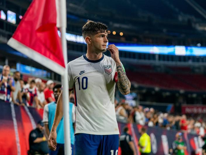 Christian Pulisic #10 of the United States takes a corner kick during a game between Canada and USMNT at Nissan Stadium on September 5, 2021 in Nashville, Tennessee.