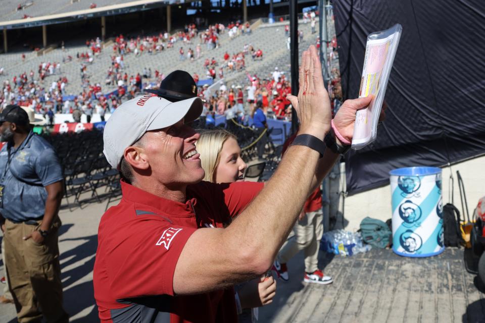 OU coach Brent Venables celebrates after the Sooners defeated Texas 34-30 on Saturday at the Cotton Bowl in Dallas.