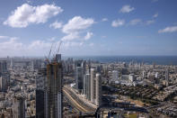 A general view shows the center of Tel Aviv, Israel, Thursday, Dec. 2, 2021. Residents of Israel's seaside metropolis Tel Aviv have for years complained of how expensive it is, with living costs taking a chunk out of their paychecks. A report released Wednesday, Dec. 1, 2021, by the Economist Intelligence Unit, a research group linked to the Economist magazine, said Tel Aviv has emerged as the most expensive city to live in. (AP Photo/Oded Balilty)