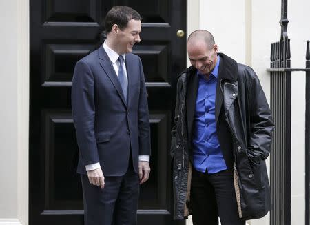 Greek Finance Minister Yanis Varoufakis (R) smiles as he poses with Britain's Chancellor of the Exchequer, George Osborne, before their meeting at Downing Street in London February 2, 2015. REUTERS/Peter Nicholls