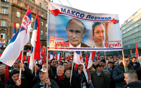 Supporters of Serbian President Aleksandar Vucic and Russian President Vladimir Putin walk towards St Sava temple in Belgrade, Serbia, January 17, 2019. REUTERS/Bernadett Szabo