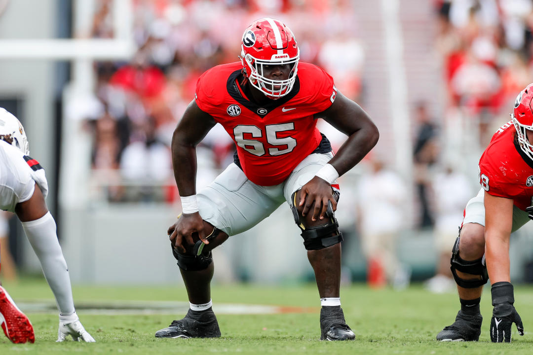 ATHENS, GEORGIA - SEPTEMBER 9: Amarius Mims #65 of the Georgia Bulldogs in an offensive stance during a game against the Ball State Cardinals at Sanford Stadium on September 9, 2023 in Athens, Georgia. (Photo by Brandon Sloter/Image Of Sport/Getty Images)