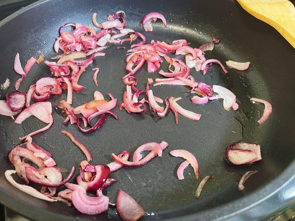 caramelized onions in a black pan