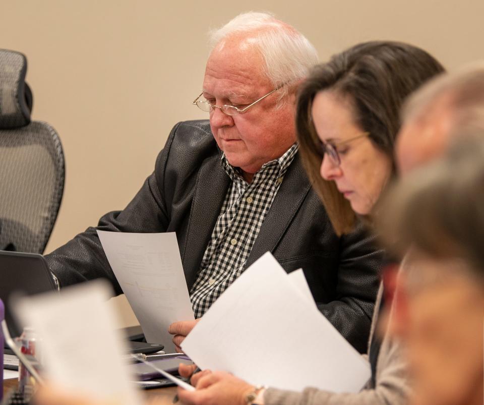 Wichita Falls ISD Board President Mike Rucker, left, and At-large Trustee Elizabeth Yeager look at documents during a meeting Tuesday, March 8, 2022.