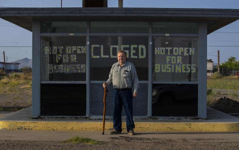 Lordsburg resident Dean Link stands at a former truck stop on Motel Drive in Lordsburg, NM.