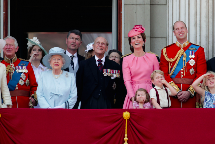 The royals on the balcony of Buckingham Palace, which is due a £370 million upgrade (Picture: PA)